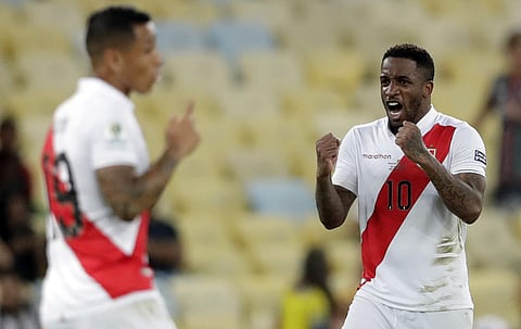 Peru's Jefferson Farfan, right, celebrates scoring his side's second goal against Bolivia during a Copa America Group A soccer match at Maracana stadium in Rio de Janeiro, Brazil. (Photo | AP)