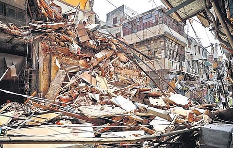 A building that collapsed in Sadar Bazaar, New Delhi, on Tuesday | Express