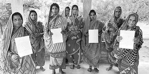 STF members holding letters written to the Chief Minister for improving sanitation in schools. ( Photo | EPS)