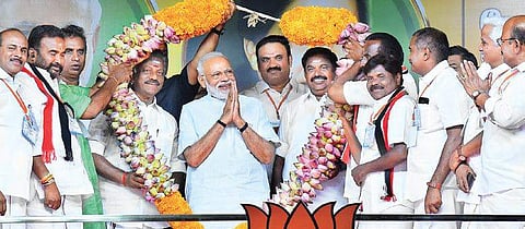 Prime Minister Narendra Modi addressing a rally in Coimbatore. With him are AIADMK’s Edappadi K Palaniswami and O Panneerselvam. | (File | EPS)