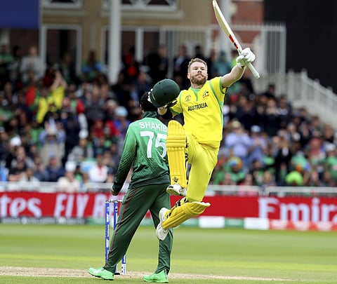David Warner celebrates his century against Bangladesh. (Photo | AP)
