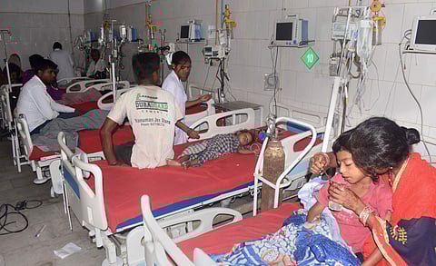 Children showing symptoms of Acute Encephalitis Syndrome AES being treated at a hospital in Muzaffarpur. (Photo | PTI)