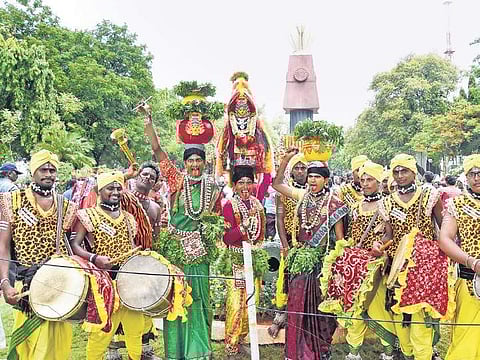 Tribals from across Telangana gather at the Martyrs’ Memorial to celebrate the inauguration of KLIS, near Gun Park in Hyderabad. (Photo | RVK Rao, EPS)