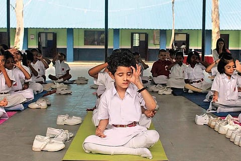 Children from Classes III and above switched from their usual assembly routine to observe International Yoga Day at Army Public School, Golconda.