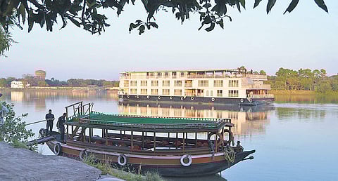 The Ganges Voyager I gliding across the river; (below, from left) temple at Kalna in West Bengal; view of the onboard suite