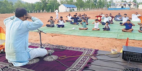 Acharya Rafik Khan conducting a yoga session.