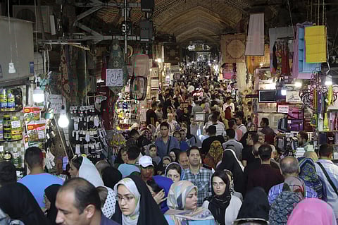People shop at the old main bazaar in Tehran, Iran, Sunday, June 23, 2019. As the U.S. piles sanction after sanction on Iran, it s the average person who feels it the most. (Photo | AP)