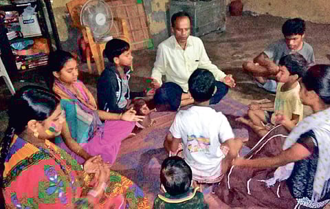 Children with special needs practicing yoga in Bhubaneswar.