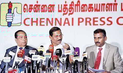 Minister K Pandiarajan addressing the press at the Press Club on Tuesday. Also seen are Industrialist VG Santhosam(left) and ValaiTamil Infor Media Private Limited director A Suresh (right) | Varun Kumar T
