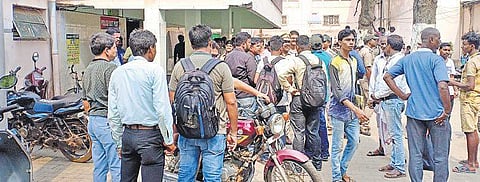 Police pacifying irate locals at PRM-MCH in Baripada. ( Photo | EPS)