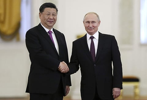 Russian President Vladimir Putin, right, and Chinese President Xi Jinping shake hands during their meeting in the Kremlin in Moscow, Russia, Wednesday, June 5, 2019. (Photo | AP)