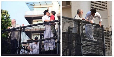 Bollywood superstar Shah Rukh Khan and his son AbRam with American talk show host David Letterman greet a massive gathering of the actor's fans in Mumbai outside his residence 'Mannat'. (Photos | Twitter)