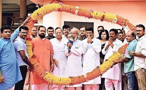 Union Ministers Dharmendra Pradhan and Pratap Chandra Sarangi along with BJP MPs from Odisha being greeted by party workes in Bhubaneswar on Saturday. (Photo | EPS)