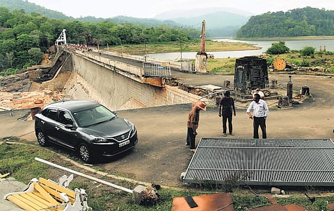 Repair work in progress at Peringalkuthu dam which suffered damage as water flowed 2.5 m above the dam top for 26 hours during the mid-August flood in 2018. The loss is pegged at around C5 crore | Albin Mathew
