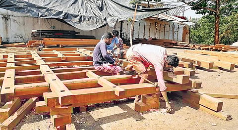 Carpenters at work to construct chariots in Koraput town. (Photo | EPS)