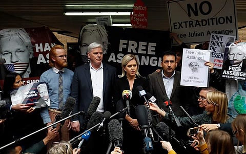 WikiLeaks' Editor-in-chief Kristinn Hrafnsson (centre L), and barrister Jennifer Robinson (centre R), address members of the media. (Photo| AFP)