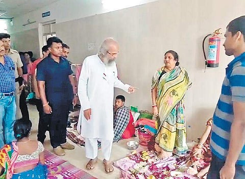 Union Minister Pratap Chandra Sarangi interacting with patients at MCH in Balasore on Sunday. ( Photo | EPS)