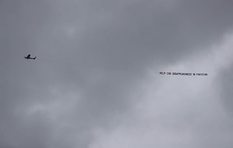 Plane carrying banner flies over Birmingham | AP