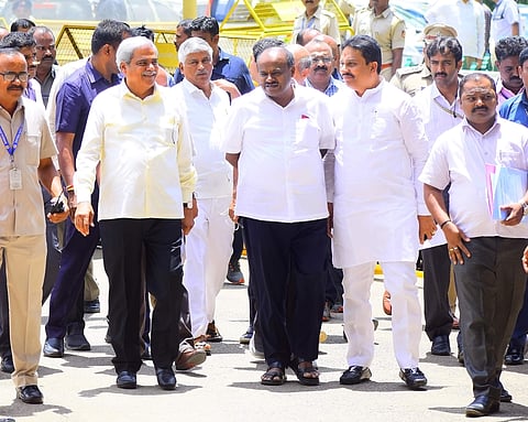 HD Kumarswamy with MLA and Minister arriving to the Assemmbly session at the Vidhan soudha in Bengaluru on Friday. | (Pandarinath B | EPS)
