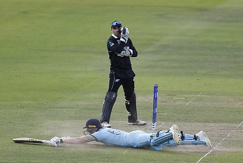 Ben Stokes dives to complete a run. (Photo | AP)