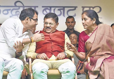 Union Finance Minister Nirmala Sitharaman, West Delhi MP Parvesh Verma and BJP vice president Shyam Jaju during a group housing societies’ convention | Parveen Negi