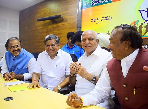 BJP Karnataka chief BS Yeddyurappa along with party members at a meeting in the BJP headquarters in Bengaluru on 9 July 2019. (Photo | Pandarinath B, EPS)