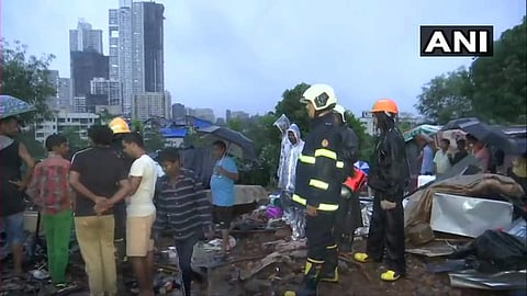 Many feared trapped under the debris after wall collapsed in Malad. NDRF team present at the spot; rescue operations underway. (Photo | ANI)