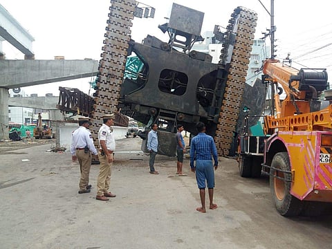 The toppled crane in Hyderabad's Shaikpet in which the operator died. (Photo | EPS)
