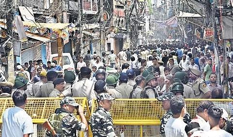 Heavy police deployment at Chawri Bazar area of Old Delhi after a mob allegedly vandalised a small temple in the area. (Photo | Parveen Negi)
