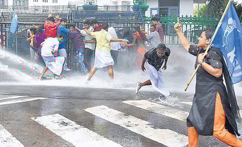 Police use water cannon to disperse KSU activists, who were demanding action against culprits in the University College stabbing incident, in front of the Secretariat in Thiruvananthapuram on Friday | B P Deepu