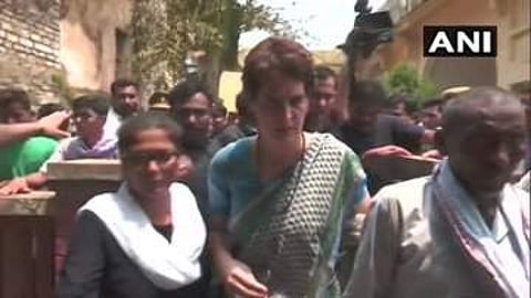 Three relatives of the Sonbhadra firing victims met Congress leader Priyanka Gandhi Vadra at the guest house where she was staying in Mirzapur, Uttar Pradesh on 20 July 2019. (Photo | ANI Twitter)