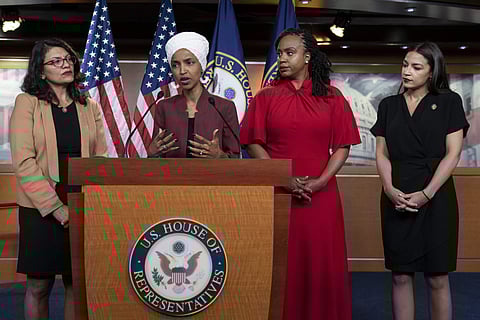 US Rep. Ilhan Omar, second from left, speaks, as U.S. Reps., from left, Rashida Tlaib, Ayanna Pressley, and Alexandria Ocasio-Cortez, listen, during a news conference at the Capitol in Washington. (Photo | AP)