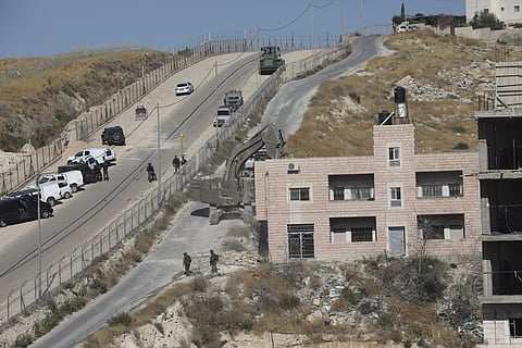 Israeli work crews have begun demolishing dozens of Palestinian homes in an east Jerusalem neighborhood. Monday's demolitions cap a years-long legal battle over the buildings, which straddle the city and the occupied West Bank. (Photo | AP)