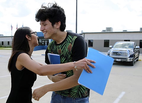 U.S. citizen Francisco Galicia, 18, gets a hug from his attorney, Claudia Galan, after his release from the South Texas Detention Facility in Pearsall, Texas, Tuesday, July 23. ( Photo | AP )