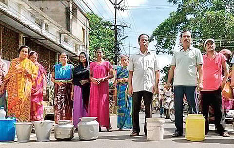 Residents of Gajapati Nagar locality staged road blockade by placing empty containers demanding supply of water to the area.