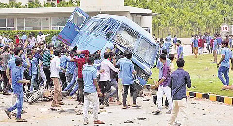 Protesters on rampage; (Below) Policemen resort to lathicharge to disburse them near Hassan | eXpress