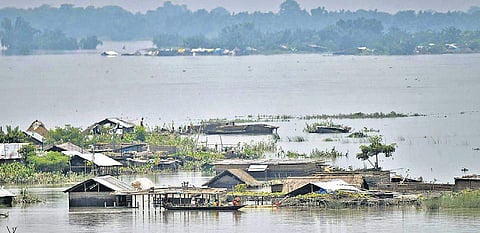 A submerged village in flood-affected Morigaon district in Assam on Thursday (Photo | PTI)