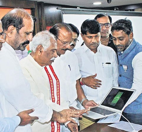 Former Union Minister Bandaru Dattatreya, BJP leader N Indrasena Reddy launch an application for the party’s membership drive in Hyderabad on Wednesday | Express