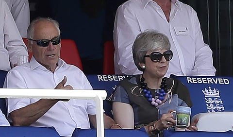 Britain's former Prime Minister Theresa May, bottom right, watches from the stands | AP
