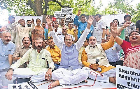 BJP MPs Vijay Goel and Hans Raj Hans (L) lead a protest on the issue of unauthorised colonies near Jantar Mantar in New Delhi on Thursday | Arun Kumar