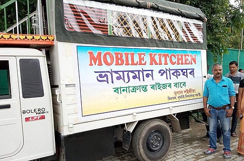Mrinal Saikia with his mobile kitchen for flood-hit Assam. (Photo | EPS)