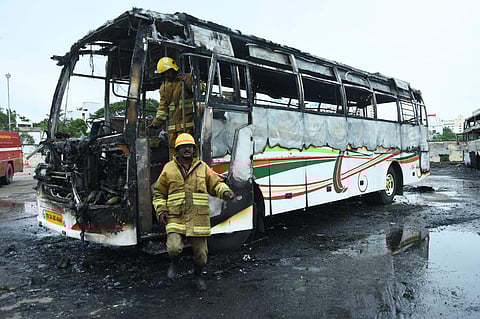 Three buses were gutted in a fire at Koyambedu Omni Bus Stand on 27 July 2019 evening in Chennai. (Photo | Ashwin Prasath, EPS)