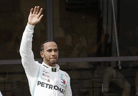 Hamilton is joined by Red Bull's Max Verstappen on the front row| AP