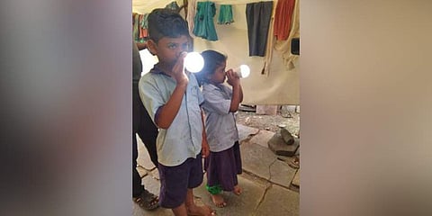 Sameer and Sania place electrical bulbs on their noses to lit them up. (Photo | EPS)