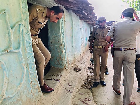 Sonbhadra S P Salman Taj Patil visits the house of a victim killed over a property dispute in Sonbhadra district Wednesday July 17 2019. (Photo | PTI)