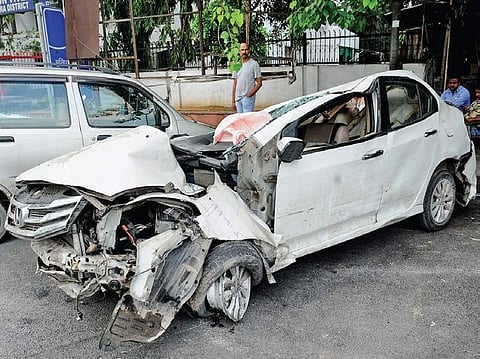 The mangled remains of the Honda City that hit a road divider, leading to the death of two persons, at Vivek Vihar Police Station on Sunday | Express