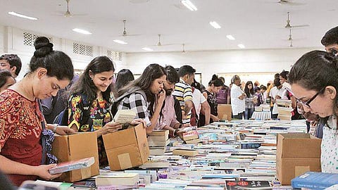 Customers can buy boxes and fill them with the books on sale at the event
