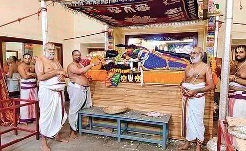 Idol of Lord Athi Varadar at Varadaraja Perumal temple in Kancheepuram. It was brought out from the Anandasaras tank five days ago | Express