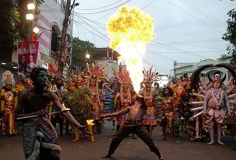 Artists taking part in ghatam performing cultural programmes as part of Bonalu celebrations in Old City, Hyderabad. (Photo | S Senbagapandiyan, EPS)