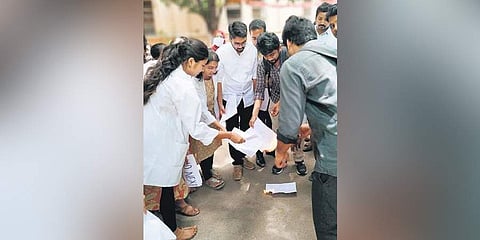 Doctors stage a protest by burning copies of NMC Bill. (File Photo | EPS)